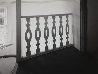 Interior.
Detail of balusters at head of stair in NE angle-tower.