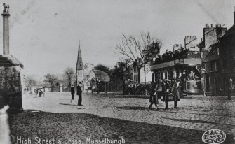 View from west showing Saint Peter's Episcopal Church and Market Cross (postcard).
Insc: 'High Street & Cross, Musselburgh', 'Vello', 'P W M Ltd'.
NMRS Survey of Private Collections.