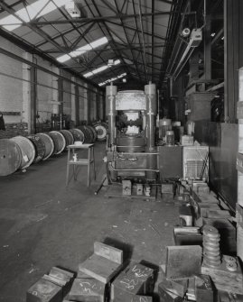 Interior.
View of ropery from E at W end of Rigging Shop, showing 1000-ton  (foreground right) and 500-ton (distant left) Presses (Note that British Ropes and Bruntons were not associated).