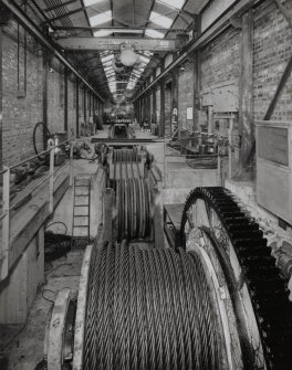 Interior.
View of ropery, 500-ton Test Range from E, with winch unit in foreground, looking up range towards anchorage.