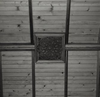 Detail of timber ceiling and decorative vent