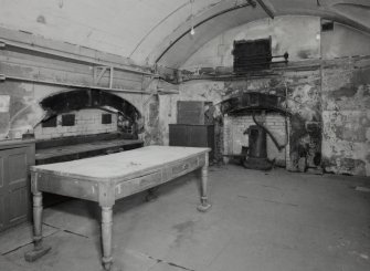 Interior. Basement. View of old kitchen from W