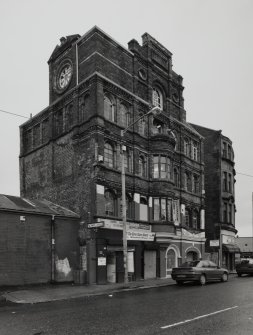 View from SE of block occupying 26-28 Bain Street, showing its E and S sides