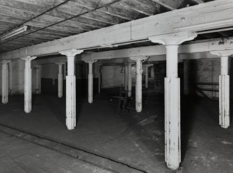 Glasgow, 65-73 James Watt Street, Warehouses, Interior.
General view of fourth floor. North area with fluted cast-iron columns and wooden floors. 
(Columns 0.16m diameter at base and 2.17 high).