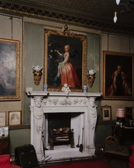 Interior.
Detail of W Drawing room fireplace probably by the Cheere studio and showing the portrait of Agnes Murray Kynnynmond by Allan Ramsay.