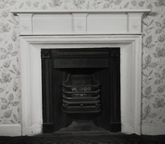 Interior.
View of fireplace in first floor NW room.