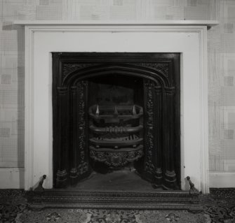 Interior.
View of fireplace in first floor SW room.
