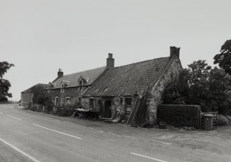Smiddy and adjacent cottage, view from South East