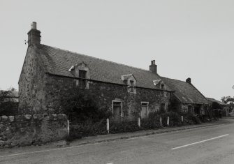 Smiddy and adjacent cottage, view from South West