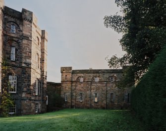 View of main house and W wing from NW