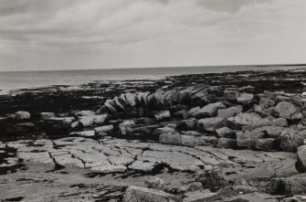 View from NW showing walling outside breakwater.