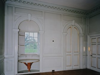 Interior. 
First floor drawing room. detail of window niches showing china shelves and drop leaf table in southern window and sliding doors of northern niche closed.