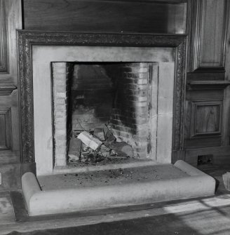 Interior. 
Second floor library, detail of fireplace.