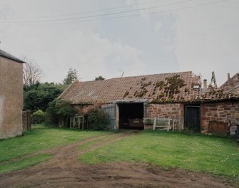 Dairy buildings and garage. View from NE