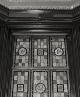Ground floor, South East room, stained glass (with bird and flower panels), detail