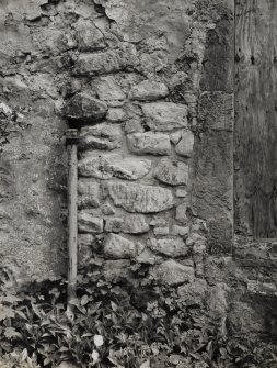 Detail of blocked opening showing junction of 17th and 19th century buildings.