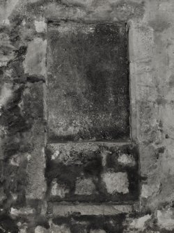 Detail of blocked opening showing bull nosed bottom grill, possibly top step of a fore-stair.