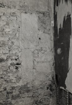 Interior.
Detail of stonework in ground floor NW room showing blocked opening.