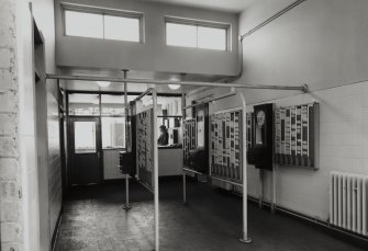 Newtongrange, Lady Victoria Colliery. 
Newbattle Central Workshops: Interior. View of timeclock and punchcards.