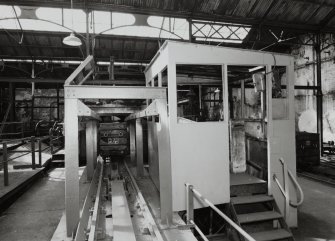 Newtongrange, Lady Victoria Colliery, Pithead Building (Tub Circuit, Tippler Section, Picking Tables)
Pithead upper decking level, Tub Circuit: view from east of cabin (possibly for tippler), with tub in tippler visible in background