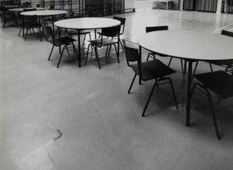 Interior.
Detail showing chairs and tables in study/dining area.