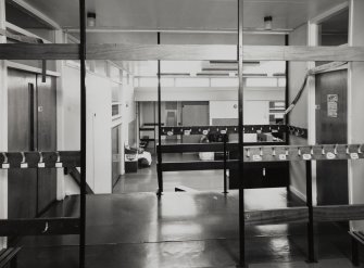 Interior.
View of E wing of communal area from N.