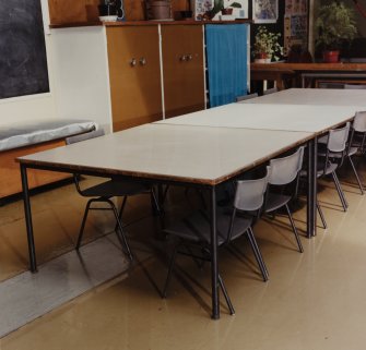 Interior.
Detail showing specimen chairs and table.