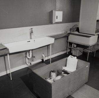 Interior.
Detail showing specimen craft sinks.