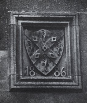 Detail of armorial panel dated 1886.