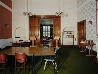 Interior.
View of former library from N looking through the original sliding doors to the drawing room.