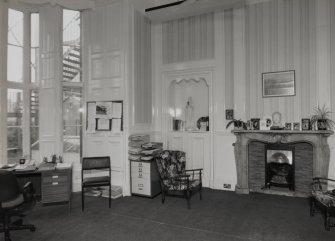 Interior.
View of former boudoir from N showing original fireplace.