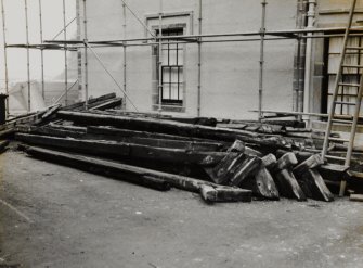 General view of roof timbers in storage