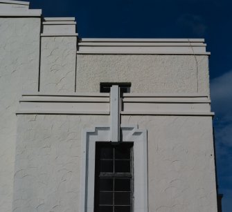 Detail showing fan shaped design of rendering on S facade