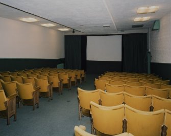 Interior. Small cinema, view from NE showing screen