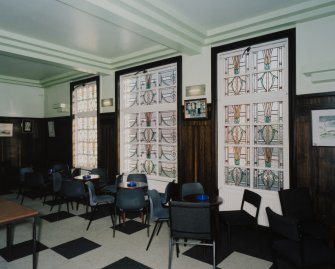 Interior. 1st floor, bar, view from W showing stained glass windows
