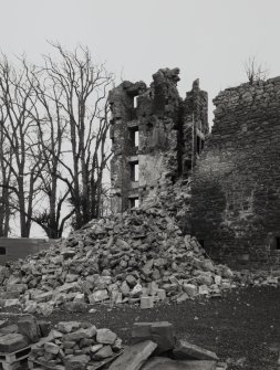 View of tower with collapsed masonry from NW.