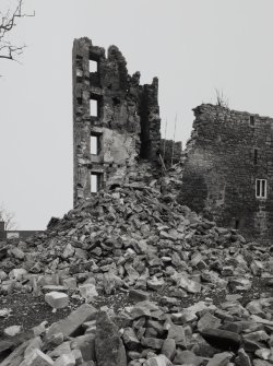View of tower with collapsed masonry from N.