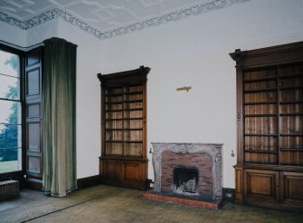 Interior. View of library with fitted bookcases