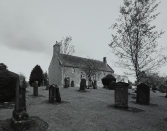 View from SW showing setting in graveyard