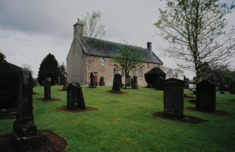 View from SW showing setting in graveyard