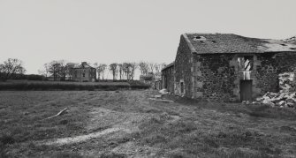 View of farmhouse and steading from SW.