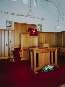 Interior. 
Detail of pulpit and communion table.