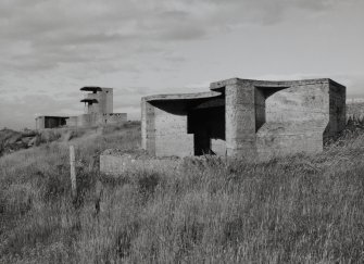 General view from East of 12 pounder and twin 6 pounder gun emplacements and observation post.