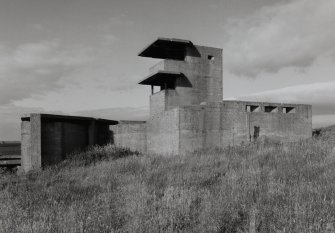 View of twin 6 pounder gun emplacements and observation post from 12 pounder gun emplacement from East