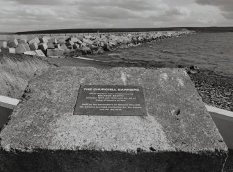 View from NE with information plaque in foreground.