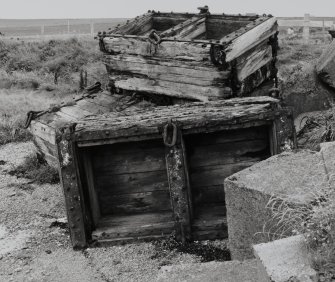 Detail of concrete block holders at S end of barrier.