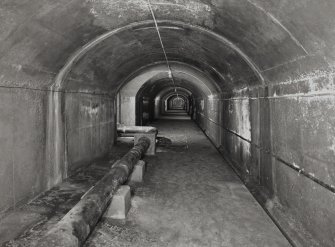 Tank access tunnel, view of interior from East.