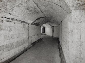 Staggered tunnel at South West corner of oil tanks, view from South.