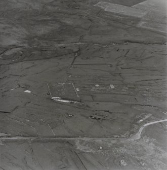 Aerial view of Orkney, Flotta, of the water tank to supply the crew of Innan Neb, Neb and Gate, Second World War coast batteries, taken from the S.  Also visible on the right side of the photograph is a barrage balloon site.