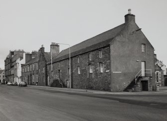 View from W of the corner of Junction Road and Harbour Street.